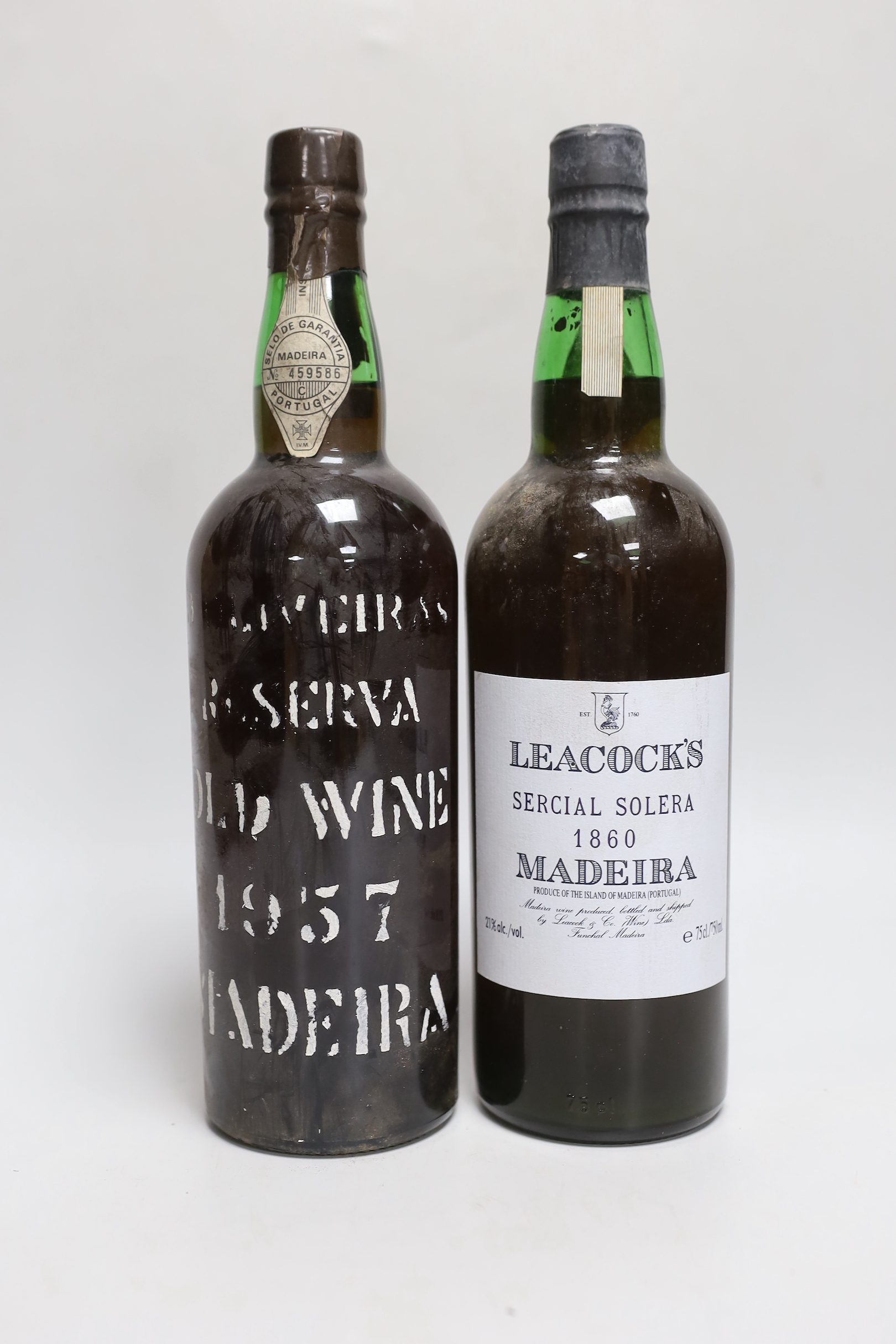 A 75cl bottle of 1860 Leacock’s Madeira Sercial Solera, together another 75cl bottle of 1957 Madeira Reserva Old Wine